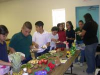 Image of students review food choices